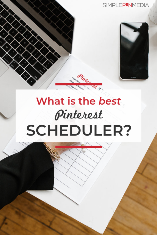 Laptop and phone on desk with woman's hand hold white pencil and text overlay "What is the best Pinterest Scheduler?".