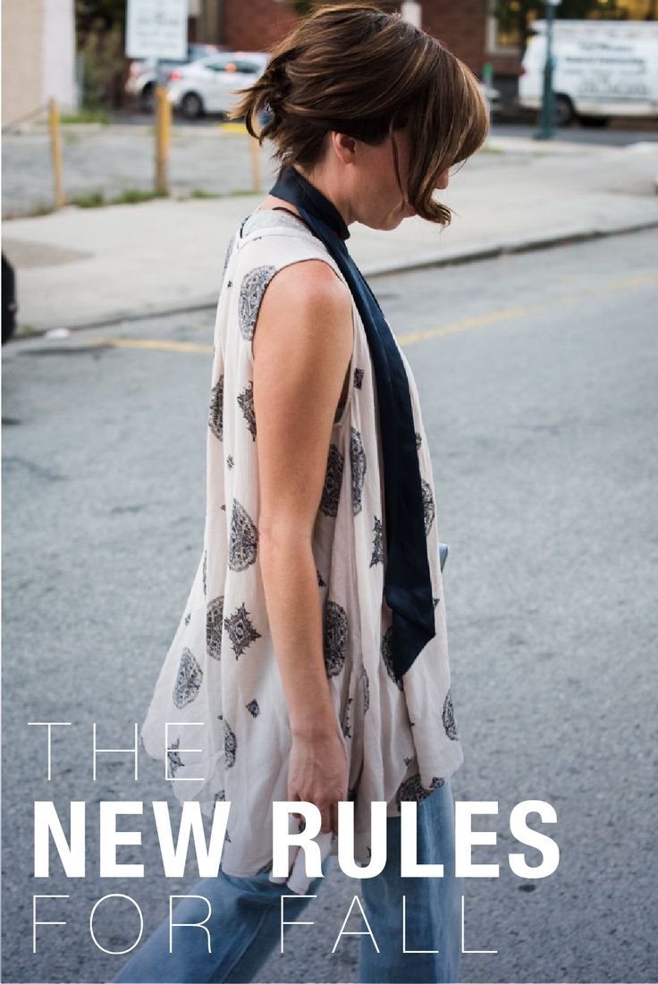 well-dressed woman walking on road. Text overlay "The New Rules for Fall".