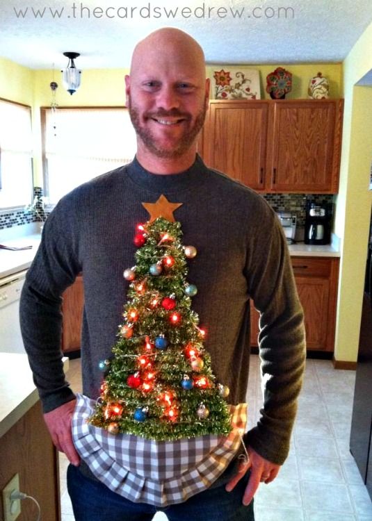 Man wearing a lit up Christmas tree Ugly Christmas Sweater.