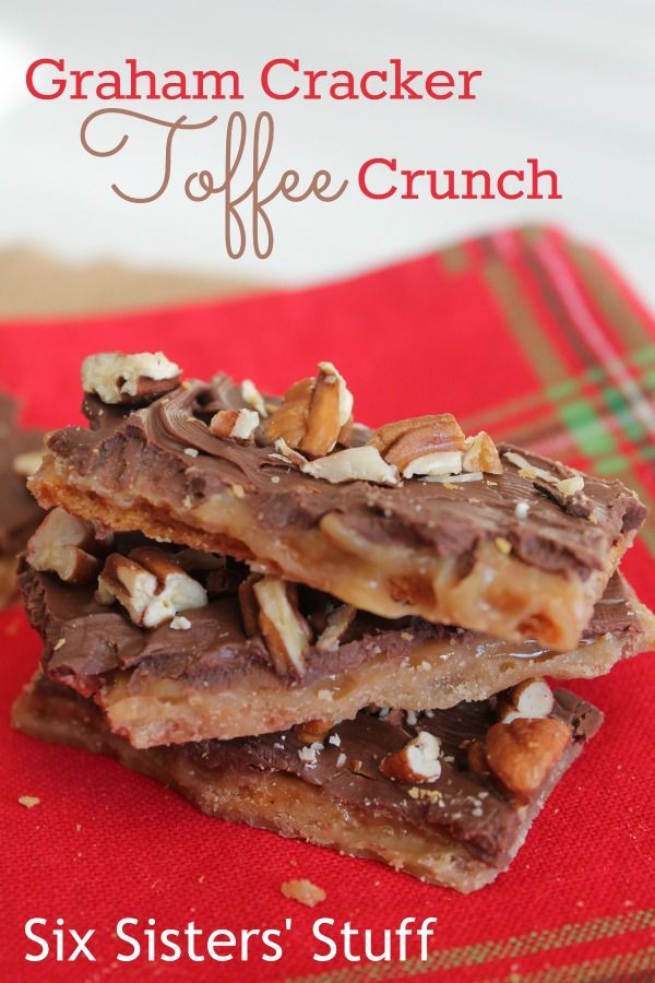 Graham cracker toffee bars stacked on a red napkin and text overlay "Graham cracker toffee crunch. Six Sisters' Stuff".