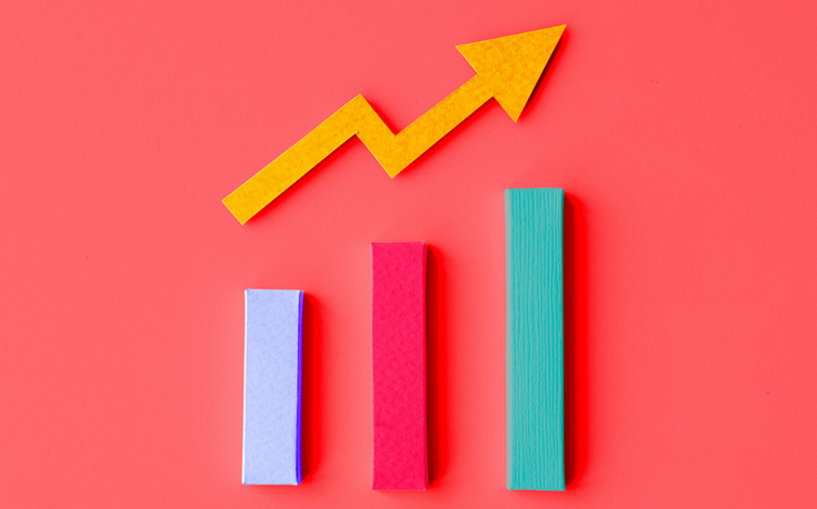 Bar graph with yellow arrow above indicating upward trend.