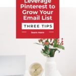 Desk with flowers text on image how to leverage Pinterest to grow your email list.