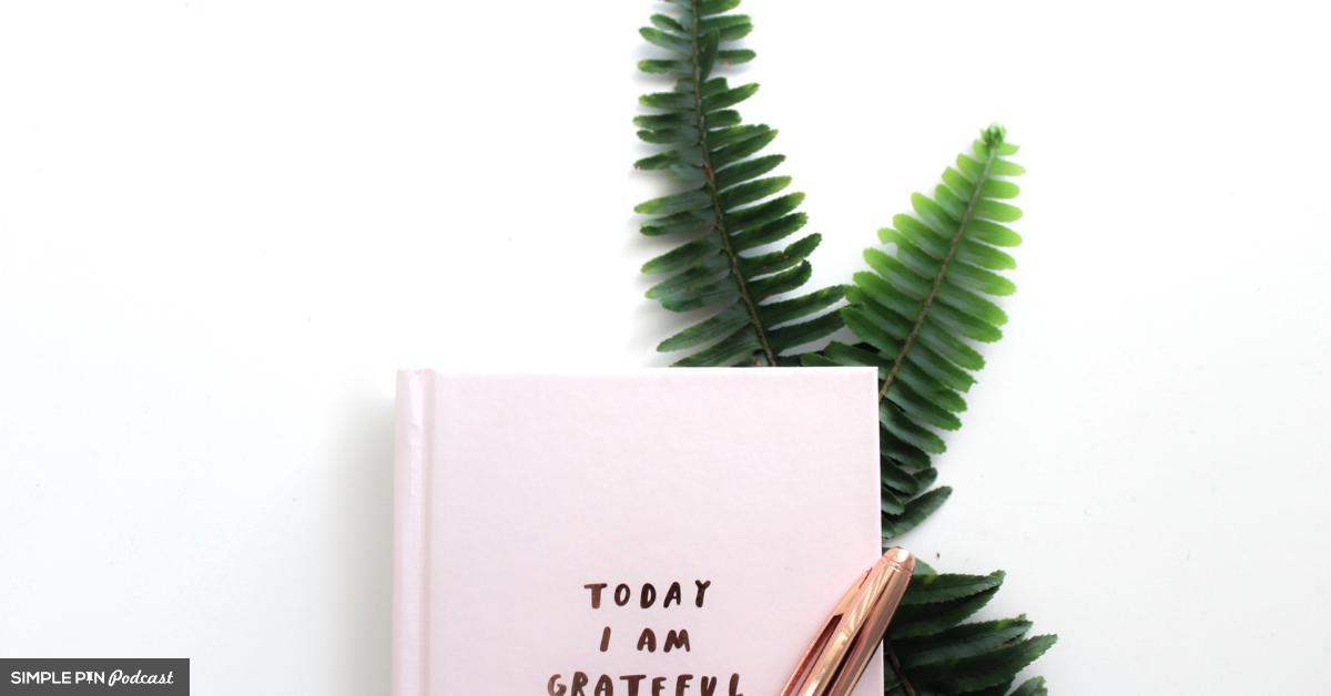 gratitude journal, pen, fern leaf.