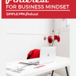 white table with laptop with text overlay "Pinterest for business mindset"