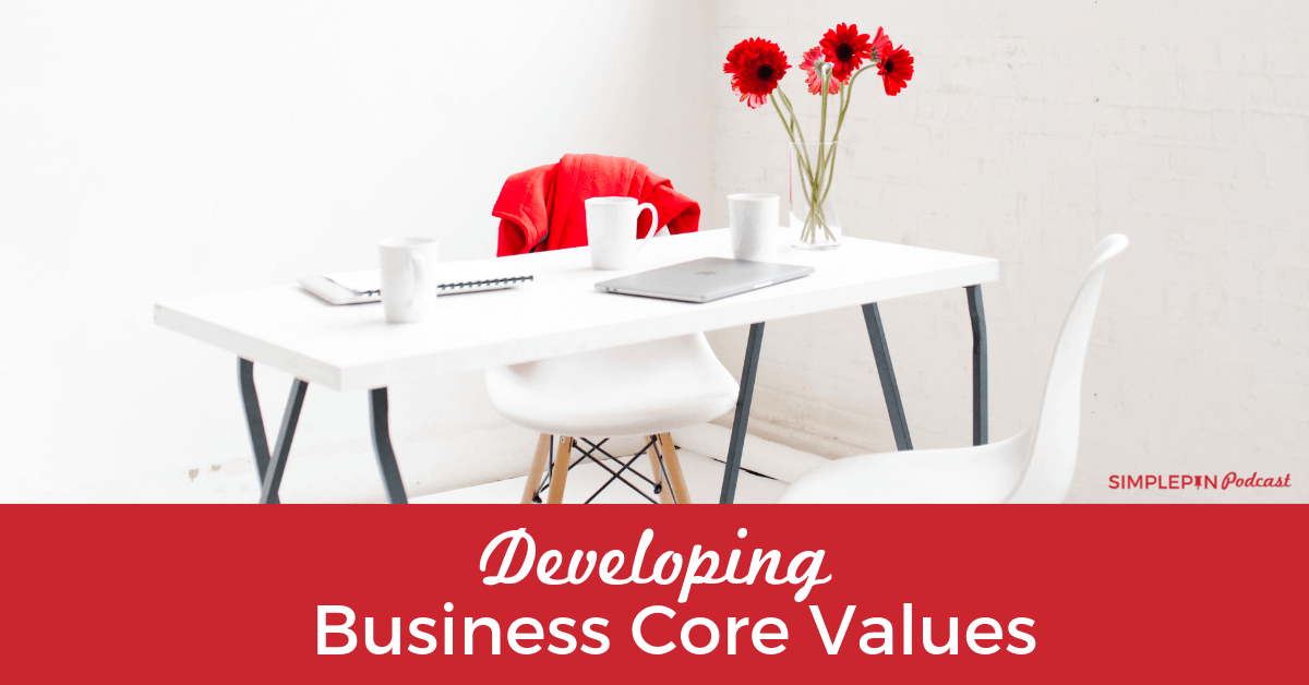 White table and chairs in white room; text overlay "Developing business core values".