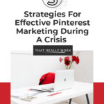 white desk with laptop and flowers. Text overlay "strategies for effective pinterest marketing during a crisis"