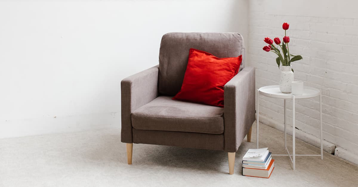 cozy reading nook with chair and side table.