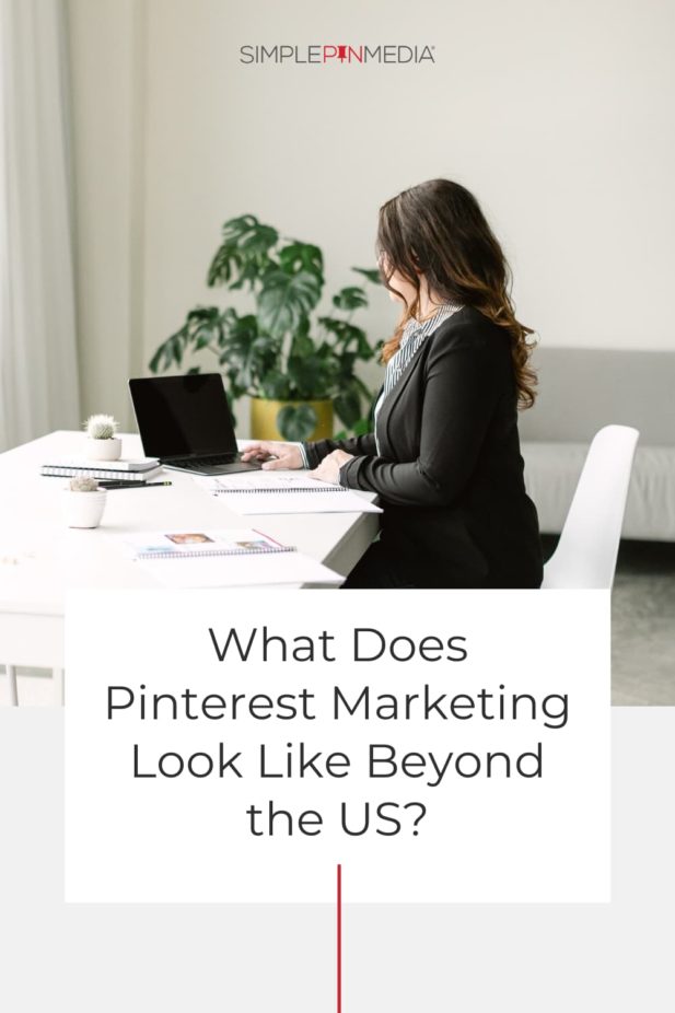 woman sitting at office desk working on computer - text "What does Pinterest Marketing Look Like Beyond the US?".