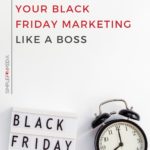 alarm clock with "Black Friday Sale" typography sign - text "How to Manage Your Black Friday Marketing Like a Boss".