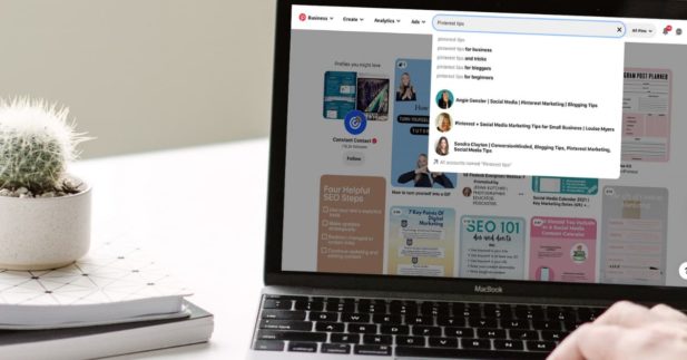 laptop computer with Pinterest search feature displayed.