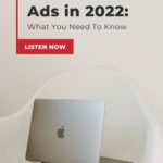 apple laptop open on desk with text "pinterest ads in 2022 - listen now".
