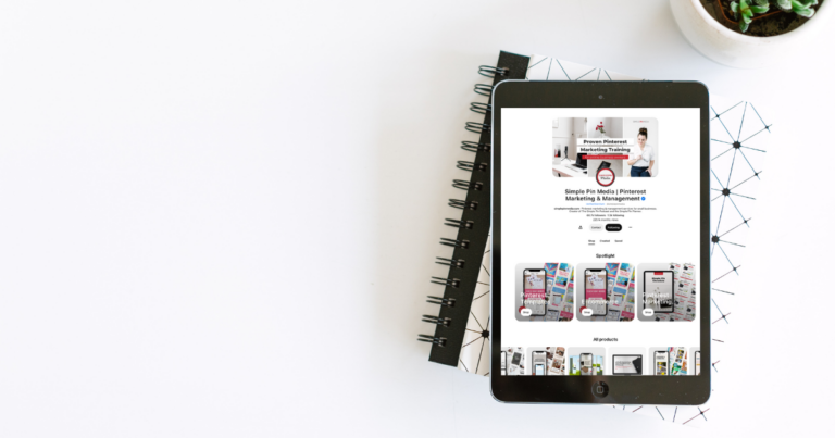 overhead shot of ipad sitting on journal with pinterest account open on screen.