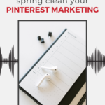 journal with airpods sitting on top with text "spring clean your pinterest marketing".