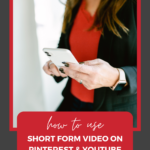 person in red shirt and black blazer holding iphone with text "how to use short form video on pinterest and youtube".