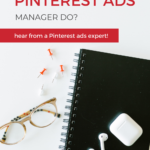 Notepad with airpods and glasses sitting on a desk with words "What does a pinterest ads manager do?"