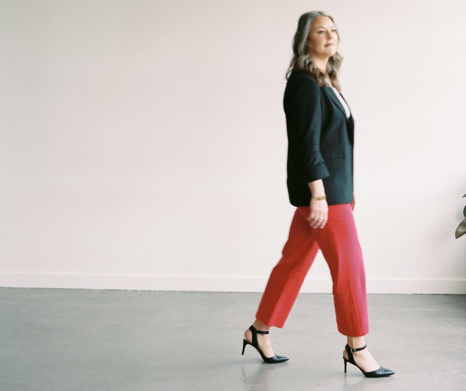 Image shows a woman walking.