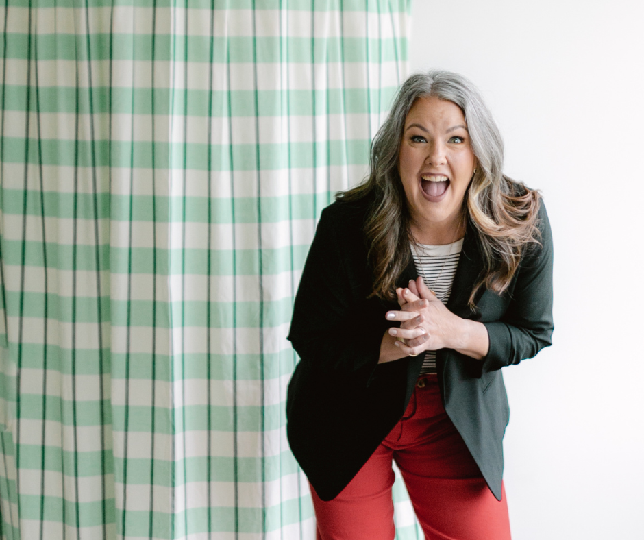 Image shows a woman laughing.