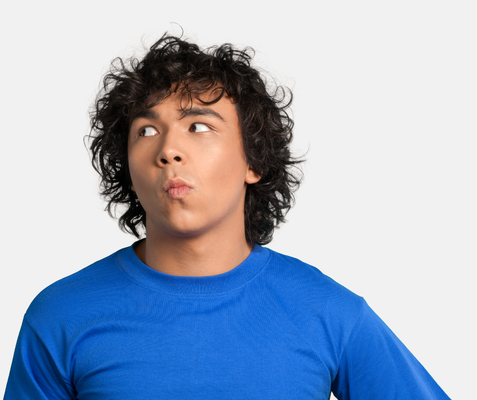 Image shows a man looking to the side.