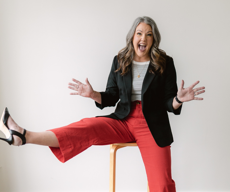 Image shows a woman sitting on a stool.
