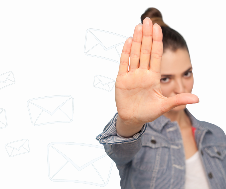 Image shows a woman raising her hand.