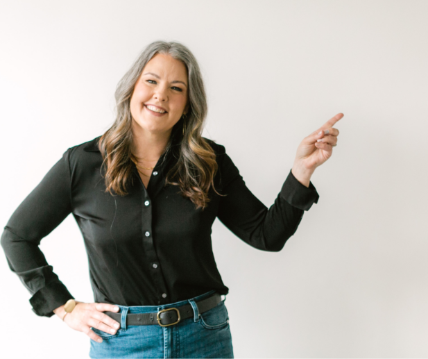 Image shows a woman pointing.
