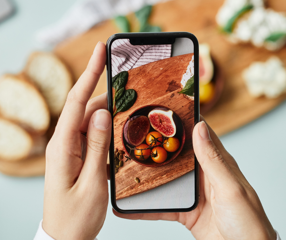 Image shows a phone with a picture of food