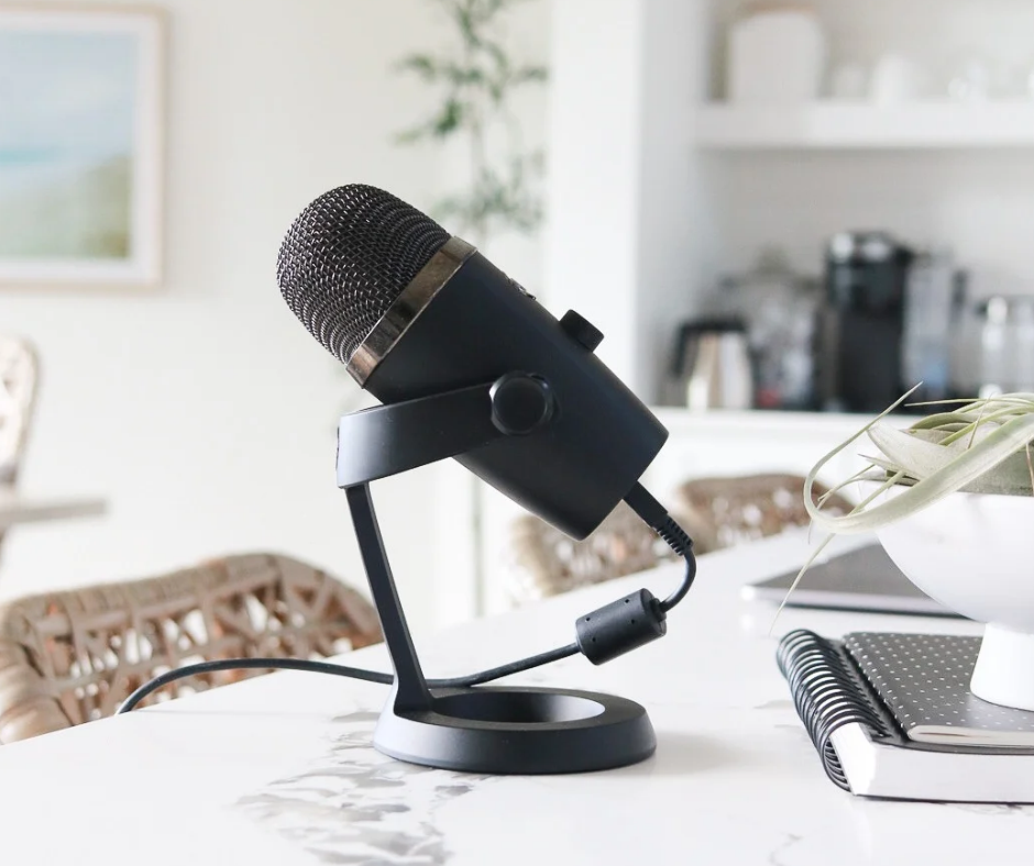Image shows a microphone on a table